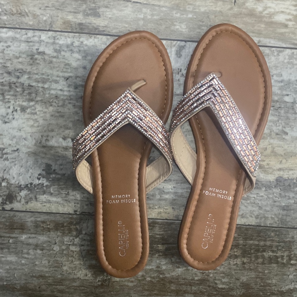 Size 10. Never worn. Memory foam insoles!